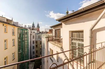 a view of a city from a balcony at Templová - Old Town Large Apartment with Terrace in Prague