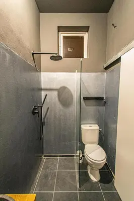 a bathroom with a toilet and a shower at 4 Bedrooms 130m2 apartment at the Main City Square in Prague