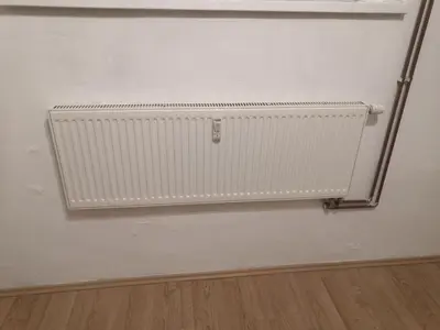 a radiator on the wall of a room at Economy flat 18 minutes from Vaclavske namesti in Prague