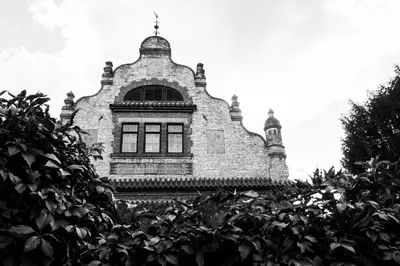 a black and white photo of a building with a window at Vila Walter & Son in Poděbrady