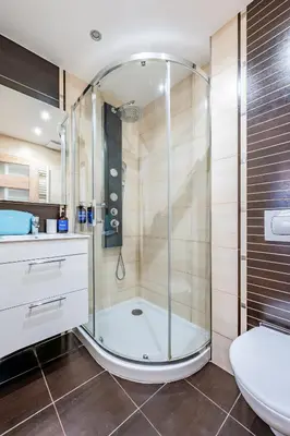 a bathroom with a shower and a toilet at Prague Days - Practical and fully equipped studio near National Museum in Prague
