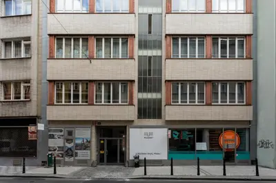 a tall building on a city street at Prague Days - Practical and fully equipped studio near National Museum in Prague