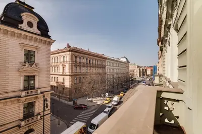 a view of a city street with buildings and cars at Charles Bridge - 3 bedroom Apartment - Old Town in Prague