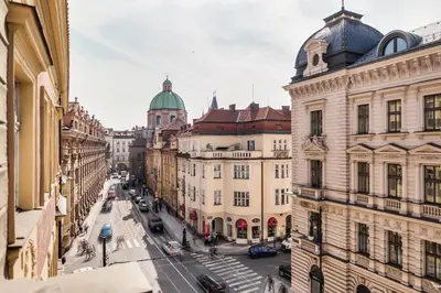 a view of a city street with buildings at Charles Bridge - 3 bedroom Apartment - Old Town in Prague