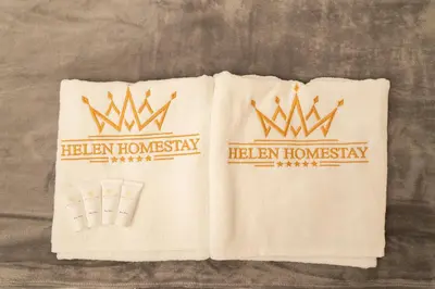 a pair of towels with a crown on them at Nice and cozy apartment right at TV tower in Prague