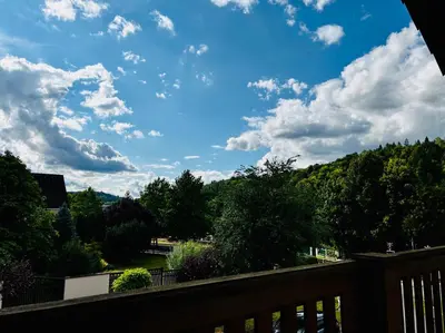 a view of a blue sky with clouds and trees at Hvězdonice Hostinec U Kuželků in Hvězdonice
