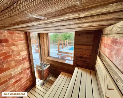 an empty room with a window in a house at You and Me Apartments in Prosenická Lhota