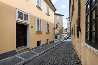 an empty street in an old town with buildings at Historic Spirit at Studio under the Prague Castle in Prague