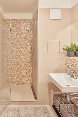 a bathroom with a shower and a sink at Prague Days - One-bedroom Apartment with Balcony and Garage Parking near the Vltava River in Holešovice in Prague