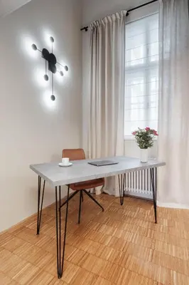 a large white building on a street at Prague Days - Loft with Garage and Workspace right next to Wenceslas Square in Prague