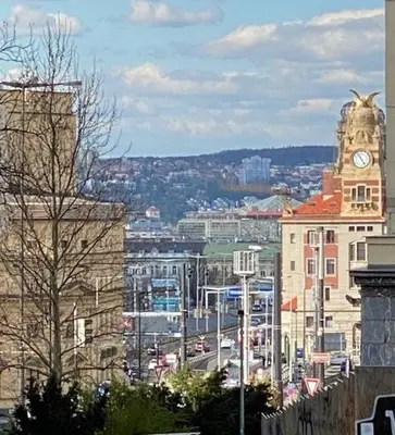 a view of a city with a clock tower at Angelo Roma in Prague