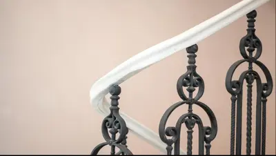a stair case with a white stair railing at Angelo Roma in Prague