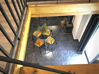 an overhead view of a dining room table and chairs at Mezonetový apartmán s terasou na samotě v lese in Vlkava