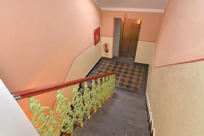 a staircase in a building with a stair case at Historic Centre Apartments I in Prague