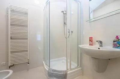 a bathroom with a shower and a sink at Jiriho z Podebrad Apartments in Prague