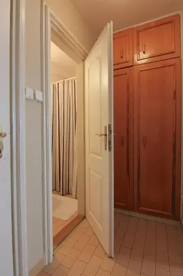 a hallway with an open door to a bathroom at 1 Bed Flat - Sleeps 2 - Wifi in Prague