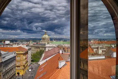 a view of a city from a window at Luma Terra Prague Hostel in Prague