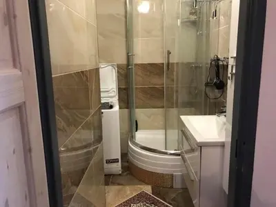 a bathroom with a shower and a toilet and a sink at APARTMEN PRAHA in Prague