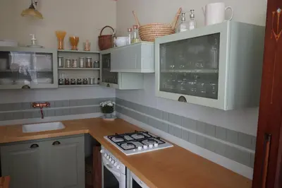 a kitchen with a sink and a counter top at U Obecního dvora - LindasFlat Apartment - Old Town Prague in Prague