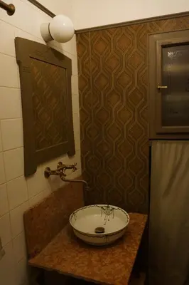 a bathroom with a shower with a glass door at U Obecního dvora - LindasFlat Apartment - Old Town Prague in Prague