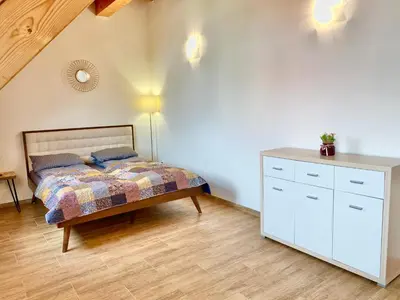 a bathroom with a tub and a sink and a toilet at Relax Apartment in Prague