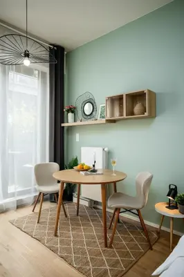 a dining room with a table and chairs at Prague Days - Premium Studios w Stunning Terraces - Easy City Access in Prague