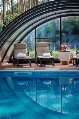 a backyard with a swimming pool and a gazebo at RelaxClub Kersko in Hradišťko