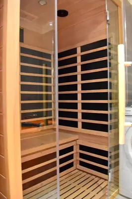 a sauna with a glass shower in a bathroom at NEW CENTRAL ROOFTOP with private WELLNESS, Sauna & Whirlpool bath in Prague
