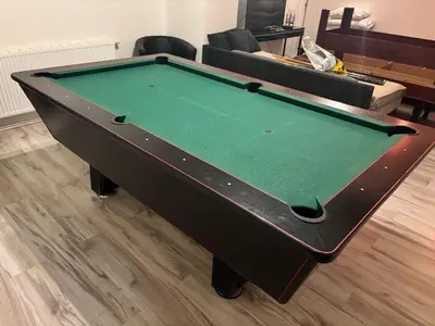 a green pool table in a living room at 3 Bed Flat - Sleeps 20 - Smoking room - Wifi in Prague
