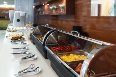 a buffet line with many different types of food at Hotel Ehrlich Prague in Prague