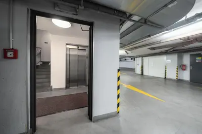 an empty room with an open door in a building at Hotel Ehrlich Prague in Prague