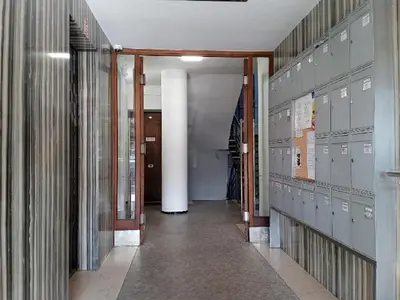 a hallway with lockers in a locker room at Cozy studio in the heart of old Prague near the Charles Bridge in Prague