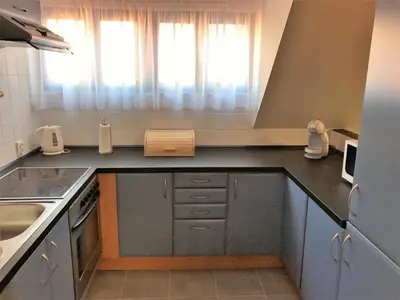 a kitchen with a sink and a counter top at Old Prague House in Prague