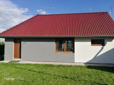 a kitchen with white cabinets and a sink at Ubytování Záluží in Kozlovice