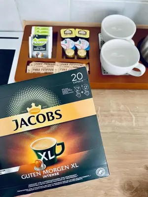 a box of jacobs coffee on a table at Apartmány Bryksova in Prague