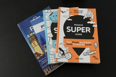 two brochures for a puzzle super guide at LIKE AT HOME IN CENTER OF PRAGUE in Prague
