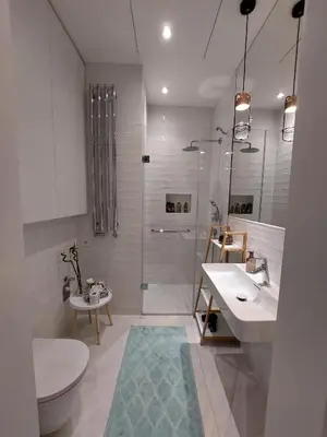 a bathroom with a toilet and a sink and a shower at Luxury apartment in the centre in Prague