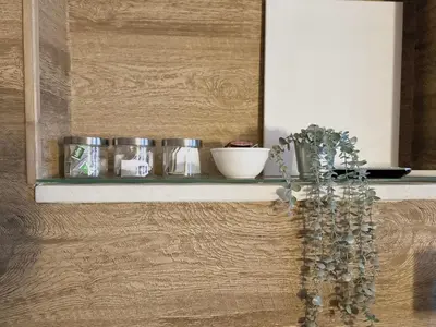a vase sitting on a table next to a railing at Unique Prague Apartment in Prague