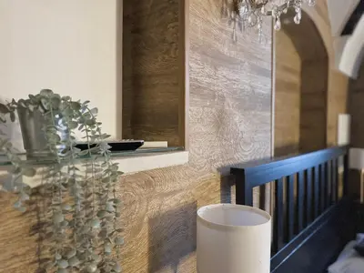 a bathroom with two sinks and a toilet and a shower at Unique Prague Apartment in Prague