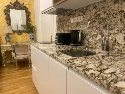 a kitchen with a sink and a counter top at NaNa Flat in Prague