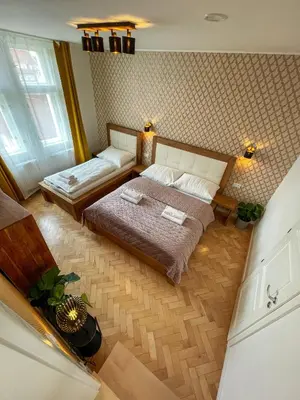 an overhead view of a bedroom with two beds at Štupartská - Attic Old Town Residence in Prague