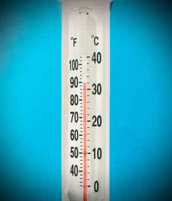 a white thermometer with a temperature rise at Wellness Aqua House in Prague