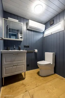 a bathroom with a toilet and a sink and a mirror at Houseboat - best place in Prague in Prague