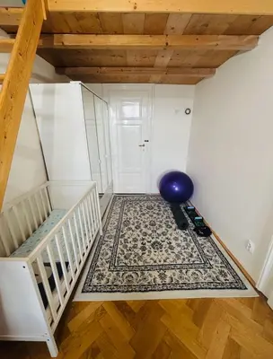 a room with a staircase and a balloon on the floor at Wenceslas square apartment 150 m2 in Prague