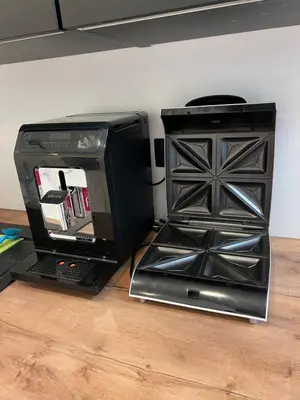 a computer and a printer sitting on a wooden table at Wenceslas square apartment 150 m2 in Prague