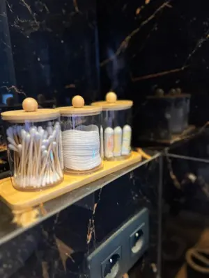 a shelf with plates and utensils on it at Wenceslas square apartment 150 m2 in Prague