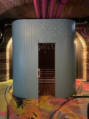 a blue pillar with a door in a room at SPA SPA Opletalova in Prague