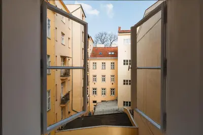 a view from an open window of a building at Prague Days - Open-plan Studio with AC near National Theatre in Prague