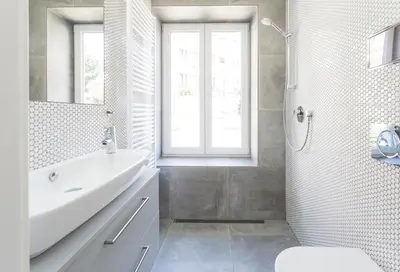 a white bathroom with a sink and a shower at TurnKey I Studio by Amazing Park in Prague