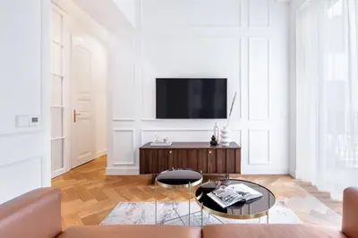 a door leading to a balcony with a table at TurnKey I Premium Apartment in Prague